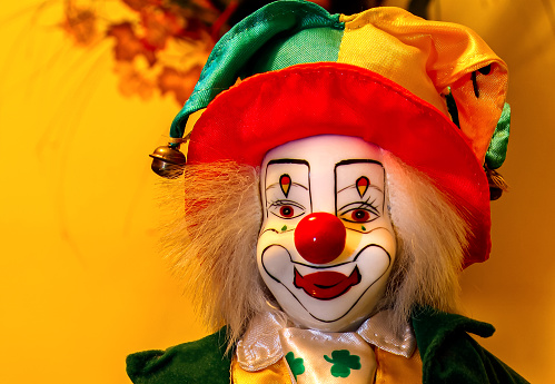 Colourful clown on a yellow background
