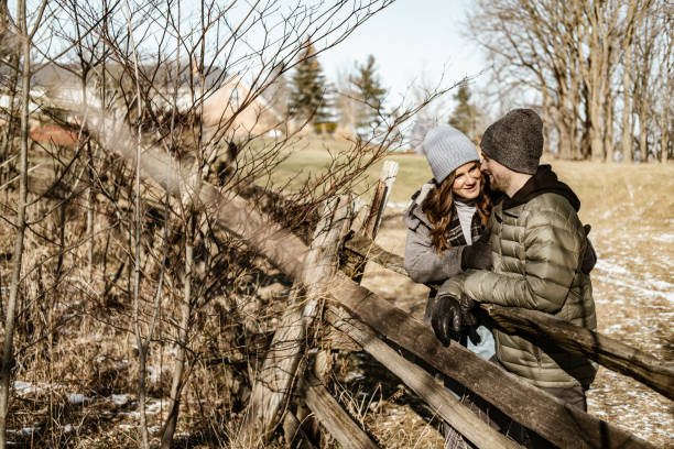 istock Young couple taking a walk in the woods 1365441000