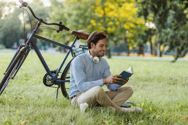 istock Businessman relaxing after work in nature 1365441788