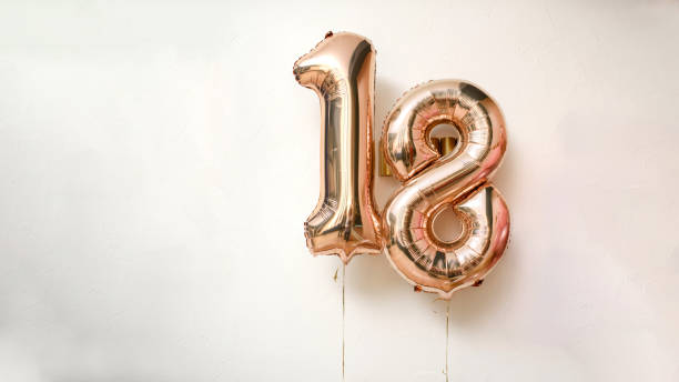 istock 18 years balloons on the white wall. 1365444166