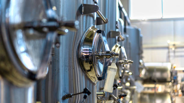 istock Metal tanks with beer at the brewery 1365444302
