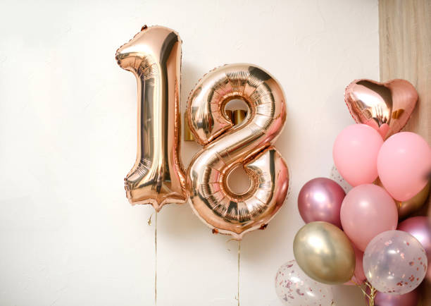 istock 18 years balloons on the white wall. 1365444479