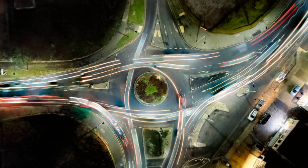 Looking down at the light trails on a roundabout in Ipswich, Suffolk, UK stock photo