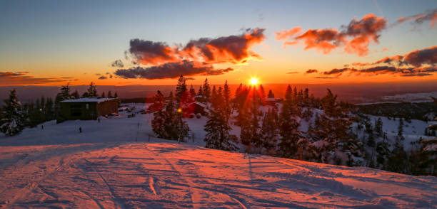 Sunset night skiing at Bogus Basin ski area in Boise, Idaho stock photo