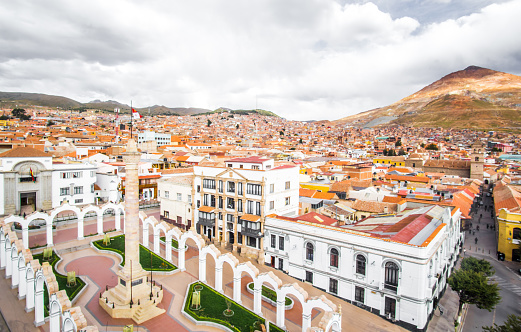 Vista panorámica sobre la ciudad y la plaza principal de Potosí con el famoso Cerro Rico al fondo, Bolivia photo