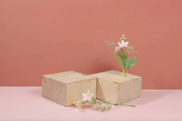 istock Abstract background with natural wooden podiums, empty showcase for display or presentation of cosmetic products, stage with geometric shapes 1365455237