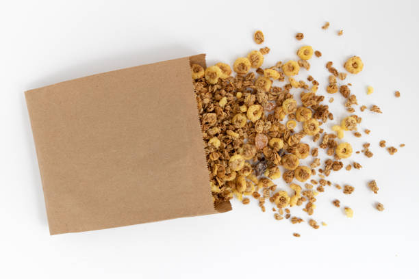 istock crunchy granola isolated on white background, top view 1365457922