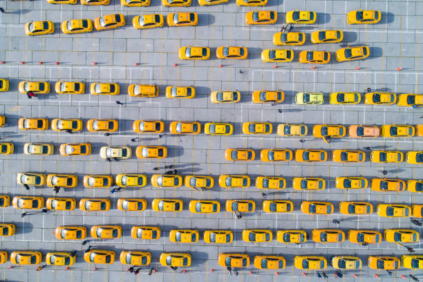istock Aerial View of Taxi Cabs 1365459556