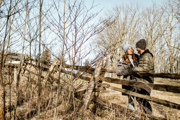 istock Young couple taking a walk in the woods 1365460193