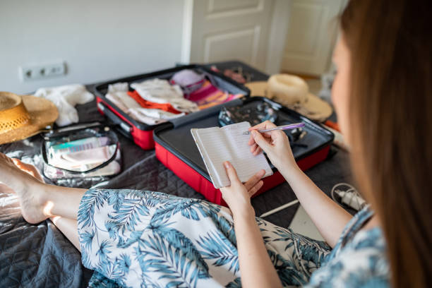 istock Young woman doing her last check to be sure if she have everything she needs for vacation 1365462118