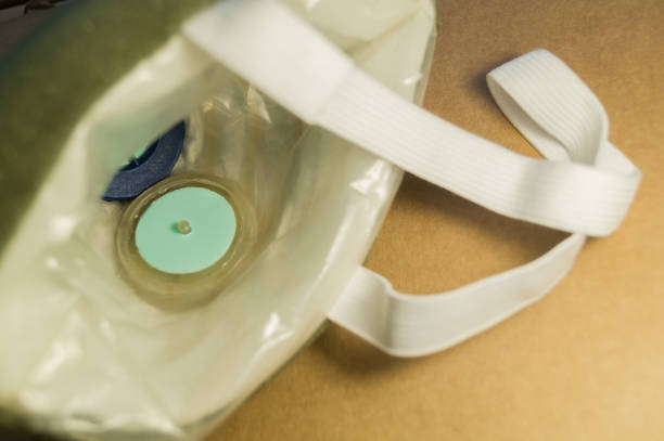istock Construction respirator. Inner part with petal valves. Protective mask for filtering the inhaled air from dust. Selective focus 1365464710
