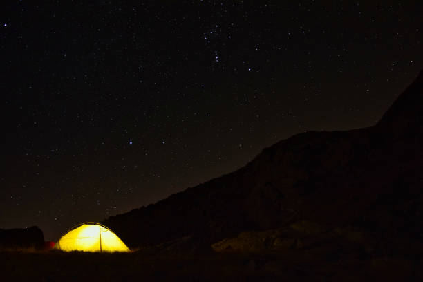 istock Sleep under the starlight, into the wild. 1365470987