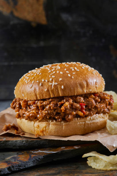 istock Sloppy Joe Burger on a Brioche Sesame Seed Bun with Potato Chips 1365472799