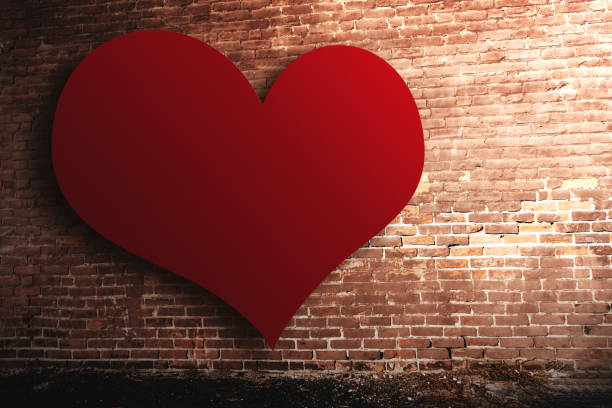 st. valentine heart shape on brick wall