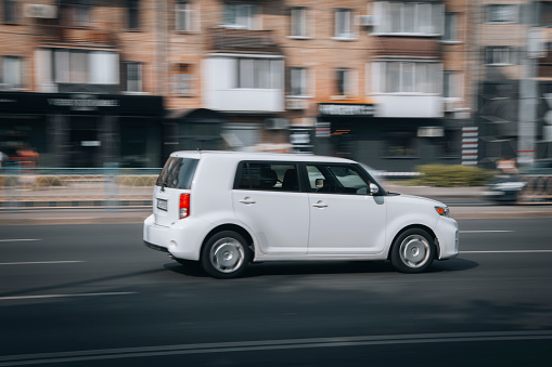 Ukraine, Kyiv - 16 July 2021: White Scion xB car moving on the street. Editorial