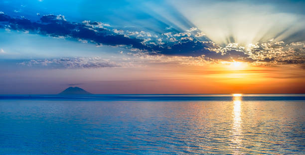 istock Scenic sunset with view over Stromboli Volcano from Tropea, Italy 1365488318