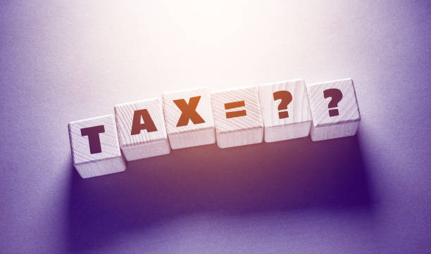 istock Tax Word with Wooden Cubes 1365494569