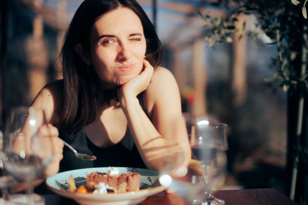 istock Stressed and Worried Restaurant Customer Eating Desert 1365505876