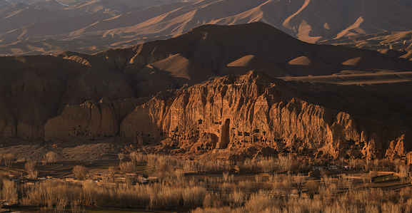 Gautama Buddha carved into the side of a cliff in the Bamiyan, Afghanistan.
