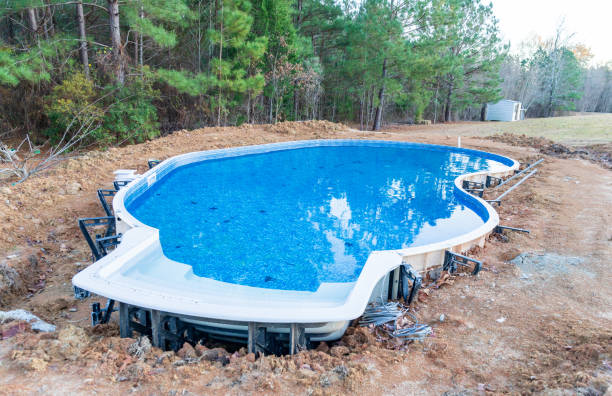 Water in new Swimming pool under construction stock photo