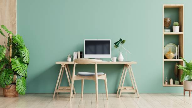 bureau vert avec un fond pastel. - white green indoors studio shot photos et images de collection