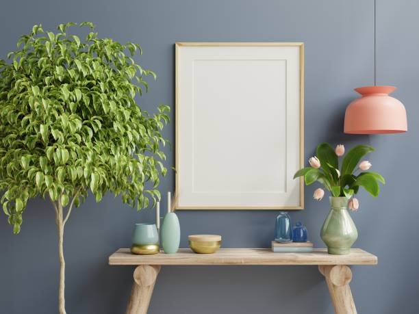 istock Interior wooden frame mockup on shelf behind the blue wall. 1365515534