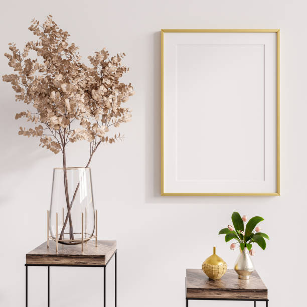 istock Mock up frame photo wall mounted in living room interior on empty white wall background. 1365516049