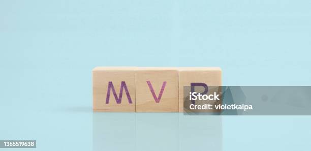 Wooden Cube With The Letter From The Mvp Word Wooden Cubes Stock Photo - Download Image Now