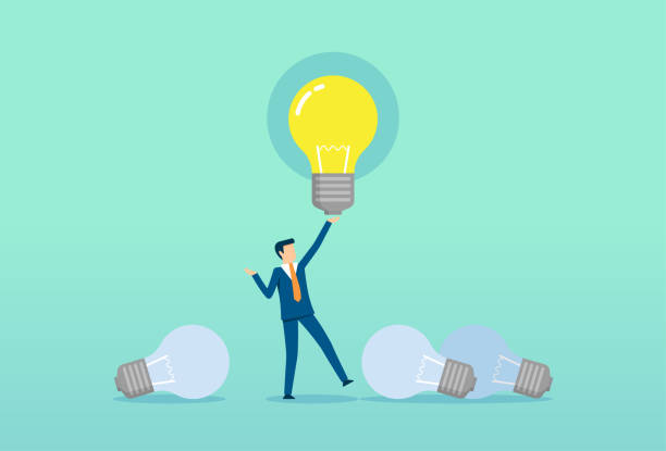 istock Businessman found a shiny light bulb, new idea for startup, business man working, business success 1365520751