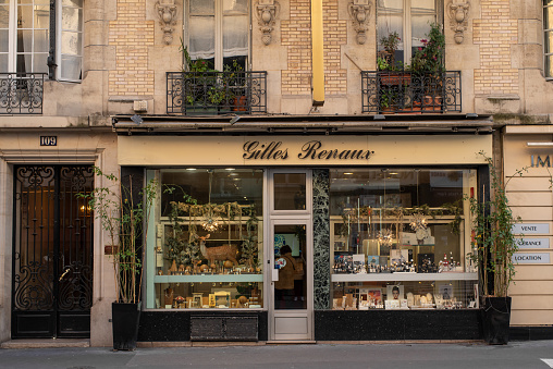 Paris, France - January 14 2022: Small jewellery store Bijouterie Gilles Renaux in Paris city centre on a cloudy winter day.