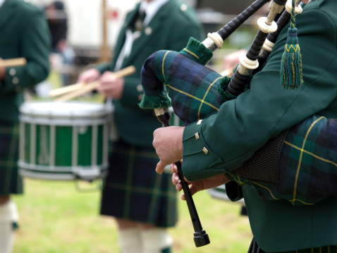 Piper playing in a Marching Band, Scotland