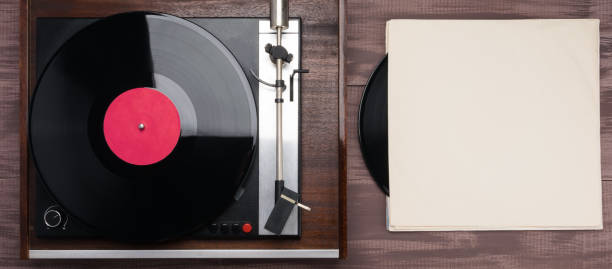 istock vinyl record and old turntable top view 1365535432
