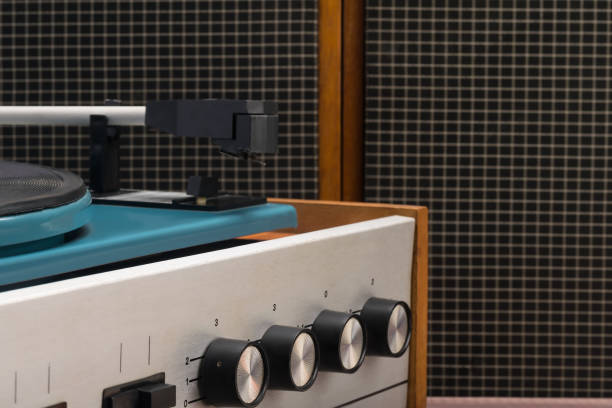 istock speakers and an old turntable, close-up view 1365535938