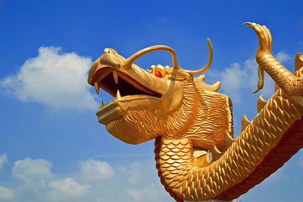 istock Chinese dragon on blue sky background 136553618