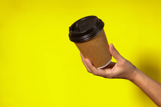 istock women's hands hold two paper cups 1365537263
