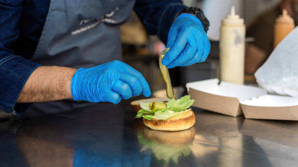 istock Cook working in a food truck 1365542051