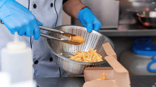 istock Cook working in a food truck 1365542335
