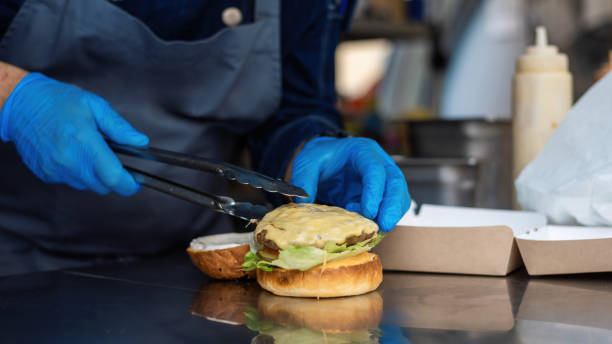 istock Cook working in a food truck 1365542522