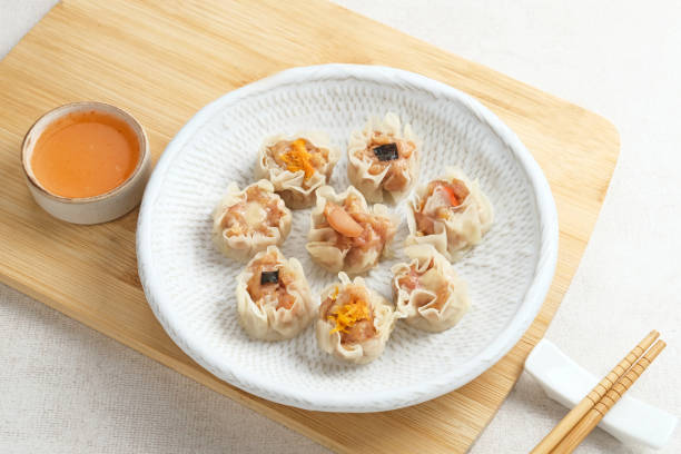 Mini Dim Sum chinese dumplings served on white plate