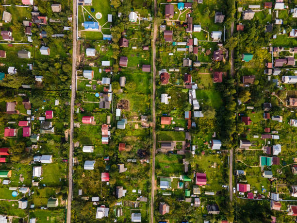 istock Flying over country houses directly above 1365545205