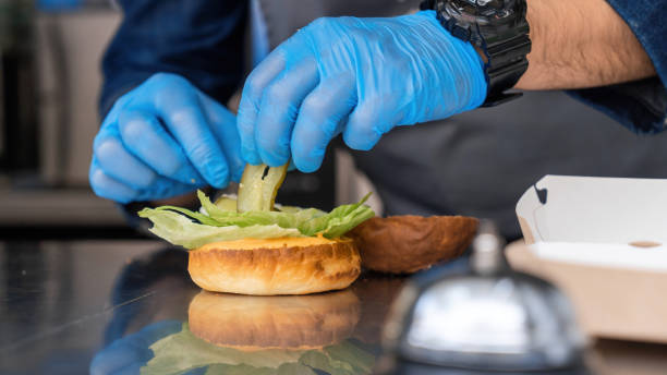 istock Cook working in a food truck 1365545444
