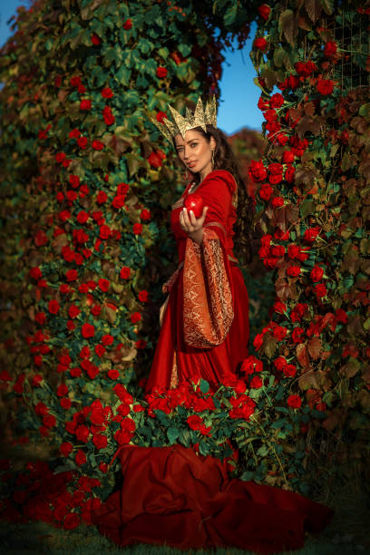 istock A beautiful brunette queen in a secret rose garden setting 1365548740