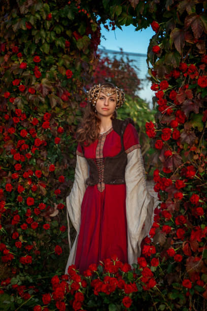 istock A beautiful blond princess in a secret rose garden setting 1365548816