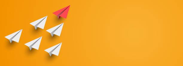 istock Individual red leader paper plane lead other on empty copy space background. Business and leadership concept. Vector 1365551647