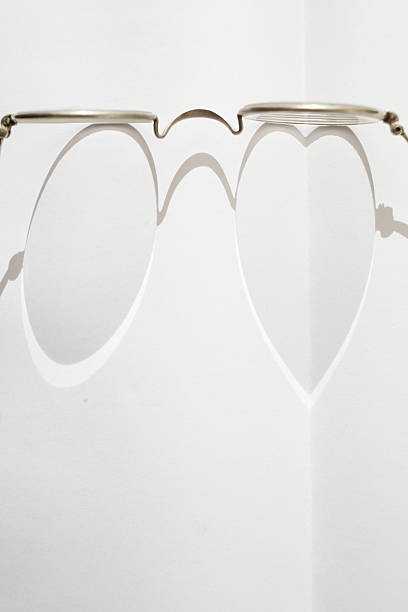 istock Eye-glass casts a heart shadow 136555256