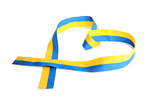Heart shaped ribbon with colors of national Ukrainian flag isolated on white