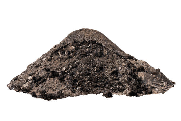 istock Old asphalt after repair in a pile on a white background. 1365554117