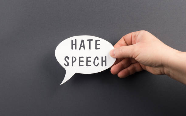 The words hate speech are standing on a speech bubble, political correctness, racism, defamation The words hate speech are standing on a speech bubble, political correctness, racism, defamation slander stock pictures, royalty-free photos & images