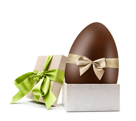 Chocolate easter egg into gift box, on white background