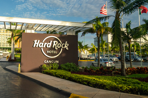 Cancun, Mexico - 16 September 2021: Hard Rock Cancun Hotel sign at the entrance of hotel. Luxury resort on Mayan Riviera, Yucatan Peninsula